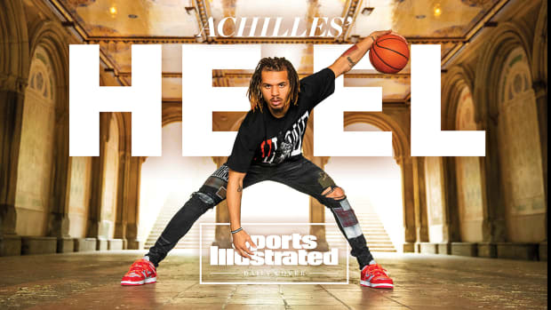 Cole Anthony dribbles